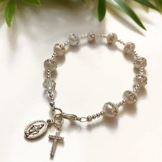 Bead: Freshwater Pearl & Clear Swarovski Crystal Size: CustomCharms: Cz Cross, Mother Mary If you have any other questions, please feel free to send me a message! Bridal Shower Photos, Personalized Bride, Rosary Bracelet, Custom Charms, Catholic Gifts, Holy Communion, Mother Mary, First Communion, Rosary