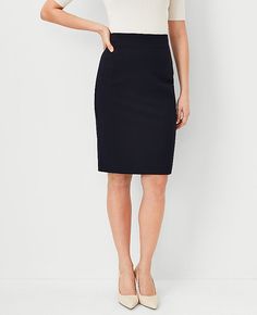 Made in seasonless stretch fabric for a refined, streamlined fit, our seamed pencil skirt radiates easy, stylish confidence. Hidden back zipper with hook-and-eye closure. Lined. Shop all Seasonless Stretch Suiting, Hit:Hits below the knee, Imported:Imported, Fit:Tailored fit, Length:24" long, Fabrication:Shell: 68% Polyester, 29% Viscose, 3% Spandex; Lining: 100% Polyester, Garment Care:Machine Washable The Seamed Pencil Skirt in Seasonless Stretch - Curvy Fit by Ann Taylor Size Classic - 8 Deep Petite Suits, Knitted Suit, Effortless Style, Ann Taylor, Stretch Fabric, Pencil Skirt, Size 10, Closet, Clothes