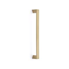 an image of a door handle on a white wall with the letter i in gold