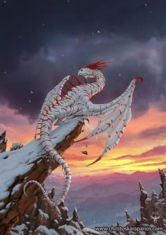 a white dragon sitting on top of a snow covered mountain under a cloudy sky at sunset