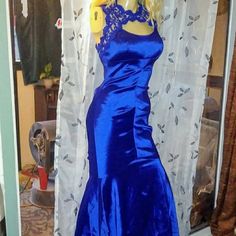 Royal Blue Mermaid Dress. Zips Up The Back But U Can't See The Zipper. It Is So Sexy And Beautiful And Comfortable. It Has Stretch To It So It Would Fit Anyone Who Is Between A Size 2 And 7. Brand New Condition. Worn One Time.