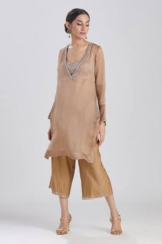 Buy Brown Satin Silk Organza Aarzoo Neckline Kurta And Culotte Set For Women by Megha Bansal Online at Aza Fashions. Hand Embellished Long Sleeve Kurta For Reception, Festive Hand Embellished Long Sleeve Salwar Kameez, Festive Long Sleeve Hand Embellished Salwar Kameez, Hand Embellished Long Sleeve Wedding Kurta, Silk Embellished Long Sleeve Sets, Festive Hand Embellished Long Sleeve Sets, Anarkali Kurta With Hand Embellished Long Sleeves, Embellished Georgette Palazzo Set With Long Sleeves, Anarkali Style Long Sleeve Hand Embellished Kurta