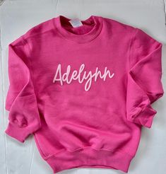 Pink Cricut Shirt, School Fleece Tops With Letter Print, Customizable Crew Neck Sweatshirt For School, School Spirit Cotton Sweatshirt With Name Print, School Fleece Sweatshirt With Letter Print, Cotton Sweatshirt With Name Print For School Spirit, Fleece Crew Neck Tops For School, Casual Name Print Sweatshirt For Winter, Casual Winter Sweatshirt With Name Print