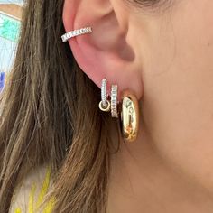 I pair these stunning huggies with the matching ear cuff. They're so elegant and shiny. Prong settings are one of my favorite styles and this sparkle proves it! Available in 14k yellow, rose, or white gold .53ctw diamond Outer diameter measures 15mm Inner diameter measures 10.5mm By EF Collection Diamond Halo Huggie Earrings, Luxury 14k Gold Huggie Earrings, Cubic Zirconia Huggie Earrings With Halo, Rose Gold Fine Jewelry Huggie Earrings, Luxury Halo Huggie Earrings, Gold Huggie Earrings With Vvs Clarity, Rose Gold Huggie Hoop Earrings Vvs Clarity, White Gold Huggie Earrings For Everyday Luxury, Small Hoop Huggie Earrings With Baguette Diamonds