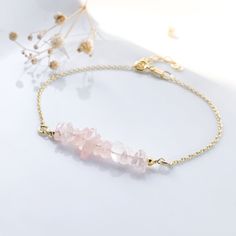 "OUR*SPECIAL*ITEM Dainty raw Rose quartz bracelet in 925 sterling silver or 18k gold plated sterling silver , Rose quartz is the Birthstone of October and January. These simple, delicate and versatil bracelet that you can wear at any occassion. Confortable to use and wear, is the perfect outfit for your day. You can combinate with other dainty bracelets. ROSE QUARTZ BIRTHSTONE : October and January Rose Quartz is the stone of universal LOVE. It restores trust and harmony in relationships, encour Modern Pearl Earrings, Citrine Bracelet, Raw Rose Quartz, Rose Quartz Bracelet, Birthstone Bracelet, Crystal Healing Bracelets, Dainty Bracelet, January Birthstone, Birthstone Gifts