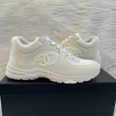 Chanel Interlocking Cc Logo Sneakers Tennis Shoes Size 40.5 In White Brand New In Box, Never Worn, No Flaws! Note: Chanel Sneakers Tend To Run Small. Chanel Interlocking Cc Logo Shoes, Luxury Sports Sneakers With Round Toe, Luxury Custom Sneakers For Sports With Round Toe, Luxury High-top Sneakers With Round Toe For Sports, Luxury High-top Sports Sneakers, Luxury Low-top Custom Sneakers With Cushioned Footbed, Luxury White Sneakers With Cushioned Footbed, Luxury Custom Low-top Sneakers With Cushioned Footbed, Luxury Sneakers With Round Toe And Laces