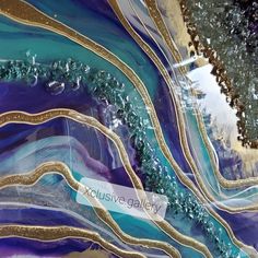 an abstract painting with blue, gold and green colors on it's surface is featured in this image