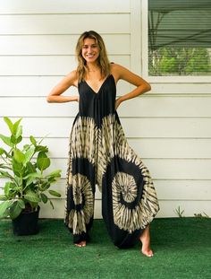 "💥One Size Fits Most Comfortable Tie Dye Indigo Hippie Jumpsuits Rompers Pants, Indigo Hippie Dress, Wide Legs Jumpsuits, Boho Clothings, Summer Clothing, Harem Dress, Beach Wear , Shibori Jumpsuits 👉Fabric: 100% Soft and Breathable Rayon 👉Black Swirls Colors 👉Adjustable Tie shoulders 👉Boho/Hippie /Festival/Beach/Tropical/Fancy/UniqueTheme 👉Jumpsuit Length: 48\" 👉Straps Length: 19\" 👉Bust up to 55\" 👉Hip up to 60\" 👉The back is identical to to front pattern 👉Flowy open legs 👉One Size Bohemian Rayon Harem Pants For Vacation, Bohemian Rayon Harem Pants For Summer, Bohemian Relaxed Fit Jumpsuits And Rompers For Loungewear, Bohemian Harem Pants For Summer Loungewear, Bohemian Rayon Harem Pants For Beach, Black Harem Pants For Beach Summer, Black Harem Pants For Beach And Summer, Black Bohemian Jumpsuit For Vacation, Summer Beach Black Harem Pants