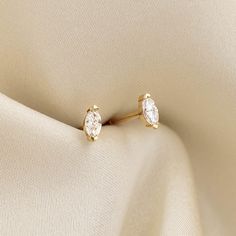 Marquise-cut diamond stud earrings, set in 14k yellow gold—classic and elegant! 


Marquise-cut diamonds measure 4mm x 2mm 

0.16 total carat weight

Butterfly back closure Gold Marquise Brilliant Cut Diamond Earrings, Gold Marquise Diamond Earrings With Brilliant Cut, Yellow Gold Marquise Cut Earrings As Gift, Yellow Gold Marquise Cut Earrings For Gift, Elegant Marquise Single Cut Diamond Earrings, Classic Marquise Cut Brilliant Diamond Earrings, Classic Gold Marquise Cut Diamond Earrings, Marquise Diamond Cut Earrings For Anniversary, Marquise Diamond Cut Yellow Gold Earrings