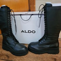 These Tall Black Combat Boots By Aldo Have Never Been Worn. Boots Are Lace Up & Side Zip. Has Sticker On Sole Of Boot & The Cardboard & Paper Inside The Boot. Comes With Box. These Astoha Boots Are Size 8.5 Womens. Tall Black Combat Boots, High Combat Boots, Outfits Runway, Tall Combat Boots, Knee High Combat Boots, Socks For Flats, Worn Boots, Lug Sole Boots, Black Combat Boots