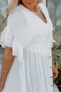 Our "Riley" button down maxi kimono can be worn as a coverup, kimono or maxi dress. This short sleeve bohemian maxi dress has a v-neckline and a drawstring waistline to show off your curvy shape. PRODUCT DETAILS: Adjustable Waist Tie One Size Maxi dresses for vacation Dresses for beach vacation Beach Coverup Not Lined Resort Dresses Colors May Vary Patterns May Vary CONTENT + CARE: 100% Rayon Machine Wash Cold, Tumble Dry Low SIZE + FIT: Model: Model is 5'3" and 5'7" Fit: This garment runs true Summer Beach Cover-up Maxi Dress With Kimono Sleeves, Flowy Beach Cover-up Maxi Dress With Kimono Sleeves, White Button-up Maxi Dress For Vacation, White Relaxed Fit Beach Dress Cover-up, White Maxi Kimono For Beach Cover-up, Maxi Kimono, Bohemian Maxi, Bohemian Maxi Dress, Resort Dresses