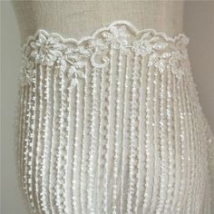 Beautiful Stripe Embroidery lace fabric with sequin and beaded This is a new style in high quality. Great for wedding dress, evening gown, Costume, cocktail dress Color: Iight White Width - 51 inches, Length - 40 inches (1M) Wholesale acceptable, please convo me Shipping Time: United Sates: 10-15 working days United Kingdom:10-15 working days Canada: 10-15working days Australia: 10-15 working days Asia:4-8 working days Europe: 10-20 working days need express mail service , please contact us Embellished Lace Embroidered Fabric For Wedding, Fitted Beaded Lace Embroidered Fabric, Fitted Wedding Lace With Sequins, Elegant Lace Wedding Dress With Sequins, Beaded Lace Embroidered Fabric For Wedding, Embellished Lace Bridal Belt For Wedding, Embellished Lace Bridal Belt, White Sequined Tulle Wedding Dress, White Beaded Lace Embroidered Fabric