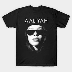 a black t - shirt with an image of a woman wearing sunglasses and the words aaliyah on it