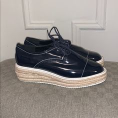 Navy Patent Leather Lace Up Loafers With A Woven Platform Base. Never Worn. Excellent Condition. Casual Platform Loafers With Brogue Detailing For Spring, Casual Brogue Platform Loafers For Spring, Spring Platform Loafers With Contrast Sole And Round Toe, Trendy Low-top Spring Platform Loafers, Trendy Low-top Platform Loafers For Spring, Trendy Spring Low-top Platform Loafers, Summer Business Casual Loafers With Round Toe, Summer Business Casual Round Toe Loafers, Spring Patent Leather Round Toe Oxfords