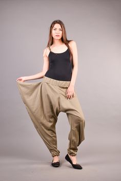 "Linen Harem Pants, Harem Trousers, Baggy Pants, Loose Pants. Extravagant harem trousers with interesting and unusual cut. The baggy pants are loose fit and feature drop crotch. The model is made of linen fabric so it is extremely comfortable women pants suitable for the daytime. If you are looking for the perfect addition to your casual outfit these loose pants are a great choice matched with flats or sneakers. ^ Sizes: The item can be made in sizes from XXS to 7XL. Please, use the size chart b Trousers Baggy, Linen Harem Pants, Black Harem Pants, Maxi Pants, Harem Trousers, Drop Crotch Pants, Pants Linen, Pants Plus Size, Boho Pants