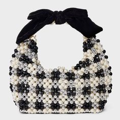 Add a touch of elegance to your looks by carrying the Beaded Checkered Bow Shoulder Bag from A New Day™. This shoulder bag is designed with faux pearls and adorned with a bow on the handle for a stunning look. Designed with a single main compartment, this hardside shoulder bag makes a perfect pick for gifting or adding to your own collection. A New Day™: Style that goes wherever you do. 2024 Wardrobe, Beads Bag, Leopard Fashion, Elevated Style, Pearl Bag, Beaded Bag, Beaded Handbag, Raffia Bag, Beaded Purses