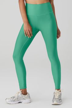 Wondering why these leggings are a fan favorite? Maybe it’s the sculpting, subtly sheeny, high-compression Airlift fabric. Or the fact that they fit like a glove, complete with a wide, double-layered waistband for a holds-you-in feel. Or the ⅞ length hems that are perfect for petites or an above-the-ankle fit. Pick your color and get ready to wear yours on repeat. Sleek High-stretch Nylon Activewear, Sleek Stretch Nylon Activewear, Solid Nylon Leggings With 4-way Stretch, Nylon Solid Color 4-way Stretch Leggings, High Stretch Full Length Green Tights, Green High Stretch Full Length Tights, Full Length High Stretch Green Tights, Alo Yoga Compressive Elastane Activewear, Compressive Alo Yoga Activewear