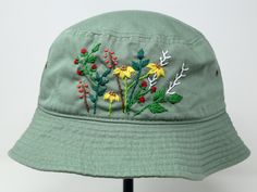 Item: flower embroidered bucket hat Material: 100% cotton Size: one size fits most Color: white, message me if you want to customize the pattern to another color Free first class shipping, upgradable priority mail service. 30 days return policy, feel confident at your purchase! Cotton Bucket Hat With Curved Brim For Festivals, Festival Cotton Sun Hat With Curved Brim, Curved Brim Cotton Sun Hat For Festivals, Cotton Curved Brim Sun Hat For Festivals, Brimmed Hats With Embroidered Logo For Spring, Cotton Festival Sun Hat With Curved Brim, Cotton Hat For Festival, One Size Fits Most, Cotton Festival Hat, One Size Fits Most, Adjustable Cotton Hat For Festival