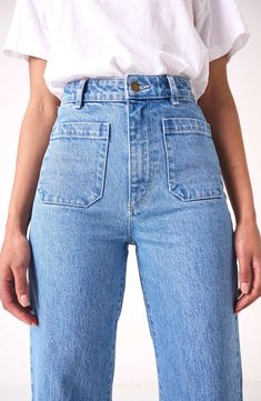 Fall for the silhouette of these high-waist jeans made from stretch-kissed denim in a light-blue wash with retro patch pockets and wide ankle-grazing hems. 28" inseam; 23" leg opening; 12 1/2" front rise; 14 1/2" back rise (size 29) Zip fly with button closure Five-pocket style 99% cotton, 1% elastane Machine wash, line dry Imported Petite Mom Jeans High Waist, Roll Up Straight Leg Jeans, Merricks Art Jeans, Other Stories Favorite Cut Jeans, Can You Cuff Straight Leg Jeans, Shea Mcgee Jeans, Charlotte Jeans, Lily Blue, Sailor Jean