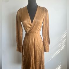 Nwt Satin Wrap Dress Size - Xs Ariana Dress Brown Fitted V-neck Wrap Dress, Chic Gold Silk Midi Dress, Elegant Gold Dress For Workwear, Spring Fitted Gold Midi Dress, Gold Midi Dress For Spring Formal, Gold Midi Dress For Formal Fall Events, Gold Knee-length Midi Dress For Formal Occasions, Chic Gold Long Sleeve Midi Dress, Brown Silk Dress For Fall