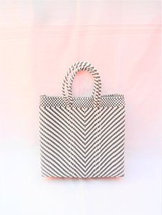 "This woven bag is made of thick and resistant plastic. Black and white color. In Mexico it is used to make purchases and that's is called 'Market bag' either 'The grocery bag'. The measurement could vary from bag to bag, because they are handmade, but this bag has the following measures aproximately : wide 12 \"(31cm) high 11\" (28cm) deep 3.5\" - 4 1/2\" (9cm) short handles 5 \"(13cm) To see more handwoven bags: https://www.etsy.com/listing/572358695/oaxacan-handwoven-plastic-tote?ref=shop_hom White Square Crochet Bag With Braided Handles, White Crochet Basket Bag For Shopping, White Woven Straw Shopping Bag, White Handwoven Straw Bag For Everyday, Everyday White Handwoven Straw Bag, White Rectangular Crochet Bag For Shopping, White Crochet Tote Bag For Shopping, White Handwoven Straw Bag For Market, White Woven Basket Bag