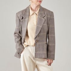 "Elevate your wardrobe with this luxurious  wool & silk Tweed Jacket for Women, that fits sizes S to M. Crafted from a premium blend of materials, this jacket boasts a composition of 72% wool, 26% silk, and 2% lurex, ensuring both comfort and style. The lining is meticulously made from 52% acetate and 48% viscose, providing a smooth and comfortable fit. This elegant blazer is designed for formal occasions, featuring golden lurex details that add a touch of sparkle and sophistication, amazing gift for old money aesthetics enthusiasts.  Its lovely beige taupe plaid print exudes elegance, making it the perfect blazer to dress up any outfit. Whether you're attending a business meeting or a formal dinner, this jacket will surely make a statement. IN excellent condition SIZE & FIT Size on tag: 3 Tailored Beige Tweed Jacket With Lapel Collar, Beige Tweed Blazer Single Breasted, Beige Tweed Jacket With Lapel Collar For Office, Beige Tweed Jacket With Hidden Button And Lapel Collar, Beige Tweed Jacket With Lapel Collar For Work, Beige Tweed Blazer With Notch Lapel, Beige Tweed Jacket For Work, Beige Tweed Blazer For Business, Beige Tweed Jacket For Office In Fall