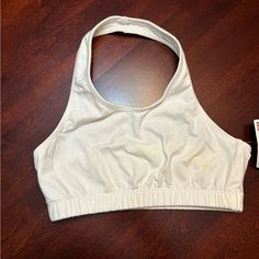 Nwt Halter Sports Bra (White), Size Medium. Item Just Didn’t Fit Properly, Needed A Smaller Size. There Is A Small Yellowish Stair (Pictured), I Think It’s From Makeup When Trying On. Item Has Never Been Worn, Pet Free And Smoke Free Home. White Sporty Crop Top With Built-in Bra, White T-back Top With Built-in Bra, Cotton Gym Activewear With Built-in Bra, Fitted White Sports Bra With Built-in Bra, White Bra-friendly Athleisure Crop Top, White Athleisure Crop Top Bra-friendly, White Stretch Crop Top For Yoga, White T-back Sports Bra For Workout, Sporty White Crop Top