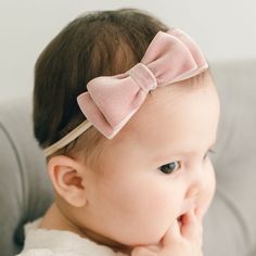 Handmade in the USA Sweet and chic, made with a super soft velvet ribbon, our tiered double loop velvet bow headband is the perfect finishing touch to her special outfit! A hand-stretched nylon band allows for a comfortable fit that will grow with your little one. Double face velvet ribbon Hand-stretched nylon Baby pictured in Large bow Cute Adjustable Hair Accessories With Satin Bow, Adjustable Pink Bow Headband, Adjustable Pink Headband With Bow, Adjustable Pink Bow Tie, Cute Adjustable Headband With Bow Tie, Cute Adjustable Bow With Matching Headband, Heirloom Gifts, Baby Pic, Large Bow