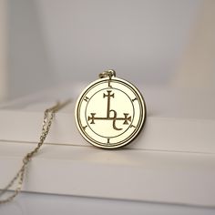 Discover the enchanting allure of the Handmade Engraved Sigil of Lilith Pendant Necklace, a captivating piece that combines mystical symbolism with elegant design. This exquisite gold-plated amulet is meticulously crafted to embody the powerful essence of Lilith, a figure of independence and strength. Material: 14K Solid Gold - 10K Solid Gold - 925K Silver - 925K Gold Filled  Design: Intricately engraved with the Sigil of Lilith Packaging: Comes in a beautiful gift box, ready for gifting Embrace the mystery and elegance of this unique pendant necklace, perfect for those who seek a connection to ancient symbols and a touch of magical charm. Whether you wear it as a personal talisman or a statement accessory, the Sigil of Lilith Pendant Necklace is sure to attract attention and admiration. C Symbolic Silver Jewelry With Laser Engraving, Symbolic Silver Laser Engraved Jewelry, Symbolic Laser Engraved Silver Jewelry, Silver Brass Jewelry With Engraving Option, Gold Spiritual Jewelry Laser Engraved, Spiritual Gold Jewelry Laser Engraved, Spiritual Gold Laser Engraved Jewelry, Spiritual Laser Engraved Gold Jewelry, Laser Engraved Spiritual Gold Jewelry