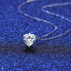 You are looking at gorgeous 1.2CT moissanite 925 sterling silver heart cut solitaire fashion necklace. The necklace features a 8.2mm/7.3mm (1 Carat) heart cut center stone, prong set in .925 sterling silver (stamped). Passes diamond tester. VVS1, Color d, Excellent cut. Comes with Moissanite Certificate. Gift Box included. Silver Heart Cut Solitaire Necklace Gift, Silver Heart Cut Solitaire Necklace For Anniversary, Silver Moissanite Heart Pendant Necklace, Silver Solitaire Heart Cut Necklace Gift, Classic Solitaire Necklace With Heart Pendant As Gift, Silver Solitaire Necklace As Gift, Silver Heart Necklace In Sterling Silver, Round Cut, Silver Sterling Heart Necklace With Round Cut, Silver Heart Solitaire Necklace