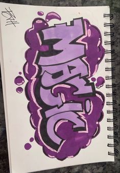 a notebook with graffiti written on it