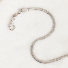 A bold snake chain bracelet crafted in sterling silver. This statement bracelet can be styled on its own or stacked with other bracelets for a contemporary look.



Snake chain has a width of 2.3mm

Bracelet has an adjustable chain that can be set between 6” to 7” long Classic Adjustable Snake Chain Bracelets, Minimalist Snake Chain Bracelet With Lobster Clasp, Adjustable Bracelet With Sterling Silver Clasp And Snake Chain, Adjustable Snake Chain Bracelet With Sterling Silver Clasp, Adjustable Box Chain And Snake Chain Bracelets, Sterling Silver Minimalist Snake Chain Bracelet, Elegant Sterling Silver Snake Chain Bracelet With Lobster Clasp, Modern Adjustable Chain Bracelet With Sterling Silver Clasp, Adjustable Modern Snake Chain Bracelet