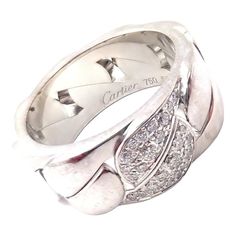 About This Piece:  Metal: 18k White Gold  Size: European 53, US 6  Weight: 15.7 grams  Stones: 22x round brilliant cut diamonds VS1 clarity, G color total weight approx. .50ct  Hallmarks: Cartier 750 53 (Serial Omitted)   Please refer to the dimensions in the description above for accurate measurements. Please reach out to the seller with any questions on dimensions or fit prior to purchase. Cartier White Jewelry With Pave Setting, Classic Cartier Diamond Ring With Pave Setting, Cartier Platinum Diamond Ring With Diamond Accents, Cartier Platinum Diamond Ring Round Cut, Cartier Platinum Round Cut Diamond Ring, Cartier Platinum Diamond Ring With Round Cut, Cartier Diamond Ring Brilliant Cut, Luxury Cartier White Gold Diamond Ring, Cartier White Gold Rings With Pave Setting