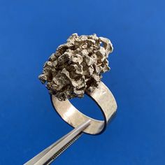 * Artisan 925 Sterling Silver Free Form Modernist Nugget Ring  * Size 7.5 * Band Width: 1/4" * Top of Ring Length: 7/8" * Top of Ring Width: 1/2" * Ring Height: 9/16" * Weight: 15 g * Unmarked * Professionally assayed. * Condition: As Pictured * s5054    Exported By ExportYourStore :) Sterling Silver Nugget Rings For Anniversary, Silver Nugget Jewelry For Anniversary, Modernist Hand Cast Sterling Silver Rings, Untreated White Gold Ring Jewelry, Hand Cast Modernist Ring As Gift, Modernist Hand Cast Ring As Gift, Hand Cast Modernist Ring, Handmade Silver Cluster Ring For Anniversary, Brutalist Sterling Silver Ring For Anniversary