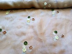 the fabric has many small flowers on it