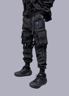 tactical techwear pants Techwear Parachute Pants With Functional Pockets For Outdoor Activities, Outdoor Techwear Pants With Cargo Style, Combat Parachute Pants With Multiple Pockets, Techwear Pants With Side Pockets, Functional Cargo Jeans For Streetwear, Techwear Nylon Bottoms With Multiple Pockets, Tactical Parachute Pants For Outdoor Activities, Functional Streetwear Cargo Pants With Multiple Pockets, Techwear Cargo Parachute Pants