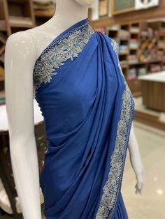 A Marvellous Embroidered Kashmiri Saree which you can wear at any party or a wedding.- - - - - - - - - - - - - - - - - - - - Product DetailsCondition: Brand NewEmbroidery: Kashmiri Aari & Tilla fusion embroideryColour: BlueF A B R I CSaree: Indian Crepe Blouse: Indian CrepeF I N I S H- UnstitchedYou can get it stitched locally.- StitchedWant your blouse ready to wear, let us know the style you want and we will stitch it for you.***PLEASE NOTE: We would require you to share certain precise body m Festive Slub Silk Traditional Wear With Embroidered Border, Festive Traditional Wear With Embroidered Border In Slub Silk, Embroidered Slub Silk Pre-draped Saree, Traditional Slub Silk Lehenga For Party, Navratri Slub Silk Traditional Wear With Embroidered Border, Unstitched Slub Silk Suit With Embroidered Border, Slub Silk Pre-draped Saree With Pallu For Party, Slub Silk Pre-draped Saree For Party, Fitted Tussar Silk Pre-draped Saree For Party