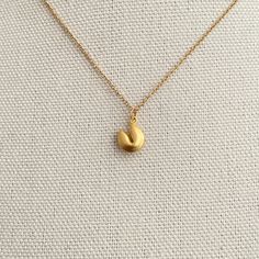 Fortune Cookie, Chinese New Year, Lucky Necklace, Good Luck Necklace Gift for Women, Fortune Cookie Pendant Charm Necklace, Gold or Silver  Item details ✰ Color: gold, silver ✰ Finish:  14K gold plated pendant ✰ Shimmering high quality 15-19" chain length ✰ High quality clasp to finish  ✰ Comes in a cute gift box, perfect for gift-giving! Cheap Good Luck Charms Necklace, Lucky Necklace, Luck Necklace, Good Luck Necklace, Cute Gift Boxes, Fortune Cookie, Luck Charm, Luck Charms, Star Necklace