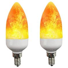 two light bulbs with flames on them