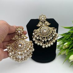 You will absolutely love the shape of this chandbala earrings set with white pearls. This comes with matching maang tikka that will optimise your Indian Wear look. *Handmade in India Bollywood Style Silver Pearl Earrings, Elegant Beaded Earrings For Weddings And Festivals, Elegant Festive Beaded Earrings For Wedding, White Pearl Chandbali Earrings, Elegant Chandbali Beaded Earrings As Gift, Chandbali Pearl Drop Party Earrings, Chandbali Pearl Drop Earrings For Party, Bollywood Chandbali Pearl Bridal Earrings, Traditional Pearl Danglers For Wedding