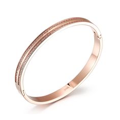 Durable and stylish, our waterproof bracelet is crafted for both functionality and fashion. Perfect for any occasion, it's the ideal accessory for those who appreciate durability and timeless elegance. Perfect for the minimalist and a beautiful piece to layer with. - 18K gold plated / stainless steel - Waterproof technology - Bangle opens and measures 56mm inner diameter. - 3mm in width. - Cubic Zirconia Luxury Rose Gold Bracelets For Everyday, Modern Rose Gold Tarnish Resistant Bracelets, Modern Rose Gold Tarnish-resistant Bracelets, Adjustable Rose Gold Plated Bangle, Rose Gold Metal Bangle For Everyday Wear, Gold Stainless Steel Bangle, Tarnish Resistant, Modern Rose Gold Plated Bracelets, Luxury Stainless Steel Cuff Bracelet, Tarnish Resistant, Luxury Stainless Steel Bracelet For Everyday Wear