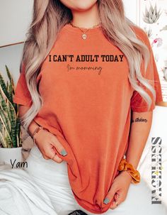 Celebrate motherhood with a sense of humor with this hilarious and relatable Funny Mom T-Shirt that proudly declares, I Can't Adult Today, I'm Momming. Perfect for moms who juggle a million things at once, this comfy and stylish tee is designed for those days when adulting takes a back seat to the joys and challenges of parenting. Crafted from high-quality, soft cotton, this t-shirt offers a relaxed fit that's ideal for running errands, school pick-ups, or just lounging at home with your little Funny Slogan Tops With Relaxed Fit, Meaningful Relaxed Fit T-shirt With Letter Print, Meaningful Slogan Cotton Tops, Funny Short Sleeve Tops For Mother's Day, Mother's Day Graphic Tee With Funny Text, Mother's Day Slogan Top With Relaxed Fit, Mother's Day Funny Text Graphic Tee, Cotton Tops With Graphic Print, Funny Cotton Shirt For Mother's Day