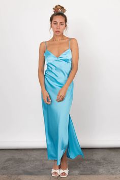 Misty Maxi Satin Slip Dress In Sky Blue – Resurrection Blue Bias Cut Maxi Length Slip Dress, Blue Spaghetti Strap Maxi Dress With Bias Cut, Blue Maxi Dress With Spaghetti Straps And Bias Cut, Summer Sleep Maxi Dress, Blue Spaghetti Strap Slip Dress For Sleep, Maxi Length Slip Dress For Bridesmaids In Summer, Spring Bias Cut Maxi Dress, Spring Bias-cut Maxi Dress, Blue Maxi Dress For Summer Loungewear