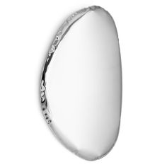 an oval shaped object is shown against a white background, with silver accents on the edges