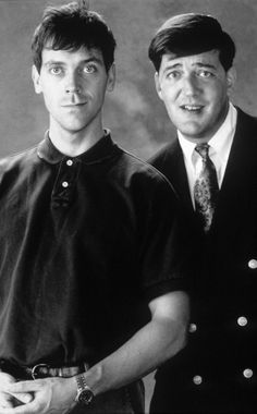 two men in suits and ties are posing for a photo with the caption, young hugh laurie and stephen fry ladybones