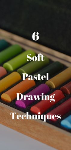 colorful crayons in a wooden box with text that reads 6 soft pastel drawing techniques