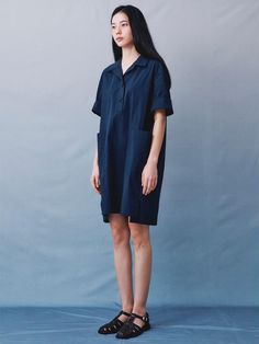 This product is a signature cocoon fit dress designed for a modern and relaxed look. The dress features a subtle oversized silhouette that drapes gently, creating a contemporary cocoon shape. Its minimalistic design, complete with a clean button-up front and short sleeves, makes it a versatile addition to any wardrobe, perfect for those who appreciate understated style. - The dress’s cocoon fit offers a modern take on comfort and style with its unique, voluminous shape.- A simple button-up front provides a smooth and uncluttered look, enhancing the dress’s minimalist appeal.- Short sleeves add to the casual elegance of the dress, making it suitable for a variety of settings and seasons.- Constructed from a lightweight fabric, the dress promises breathability and an effortl Understated Style, Minimalistic Design, Fit Dress, Oversized Silhouette, Casual Elegance, Fitted Dress, Lightweight Fabric, Dress Making, Minimalist Design