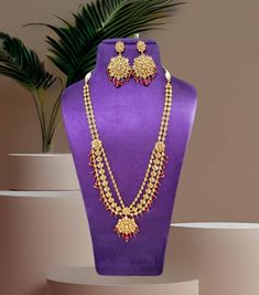 Simple Bollywood Antique gold necklace Indian Pakistani  Necklace wedding jewelry set with gold earrings women jewelry  brings hint of luxury to your outfits . This luxurious statement necklace set will add the touch of elegance to any outfit . This  Antique gold necklace Indian jewelry set looks beautiful  and elegant perfect for all occasion on any outfits you choose to wear ( wedding gowns, evening party dress, saree, salwar suits, lenga, etc.) *High quality craftsmanship 100% satisfaction guarantee  *Plated in Antique Gold plating *polki stones and ruby Beads *base metal for necklace is copper *Adjustable necklace length *package include Necklace and  Earrings *ready to ship from Houston TX United States GIFT- It comes in gift box perfect for gifting to your mom , sister, in laws, frie Gold Kundan Bridal Necklace For Celebrations, Temple Jewelry Bridal Necklace For Reception, Festive Gold Jewelry Sets With Long Necklace, Gold Jewelry Sets With Long Necklace For Party, Gold Long Necklace Jewelry Sets For Party, Gold Kundan Bridal Long Necklace, Elegant Long Kundan Necklace For Wedding, Festive Long Necklace Jewelry Set For Wedding, Festive Wedding Jewelry Sets With Long Necklace