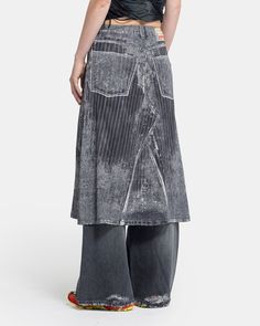 Diesel O-Hanna Denim Skirt in Black The O-Hanna Skirt features a realistic trompe l’oeil print across a soft, stretch satin midi silhouette, referencing the pinstriped devoré-denim runway look of the previous season. The skit has an A-line shape and a subtle side zip closure. - 95% Viscose, 5% Elastane. - Made in China. - Dry clean. - A13982 0LIBA. A13982 0LIBA 9XXA Tara is 6'0 (183cm) and is wearing a size M. Diesel Skirt, Denim Runway, Kiko Kostadinov, Diesel Denim, Eckhaus Latta, Stretch Satin, Inspiration Board, Helmut Lang, Issey Miyake