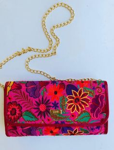 High quality 100% real leather embroidered crossbody bag. This is a one of a kind purse that complements any outfit. Wear it for daily use or dress it up. Length: 11 inches Width: 3 inches Height: 6 inches Visit us at Omxboutique.com Multicolor Embroidered Crossbody Shoulder Bag With Adjustable Strap, Multicolor Embroidery Crossbody Shoulder Bag, Pink Floral Embroidered Clutch Bag, Bohemian Crossbody Bag With Floral Embroidery, Pink Embroidered Clutch Bag, Multicolor Embroidered Crossbody Bag, Traditional Floral Embroidered Clutch For Everyday, Traditional Floral Embroidery Clutch For Everyday, Embroidered Crossbody Shoulder Bag For Travel